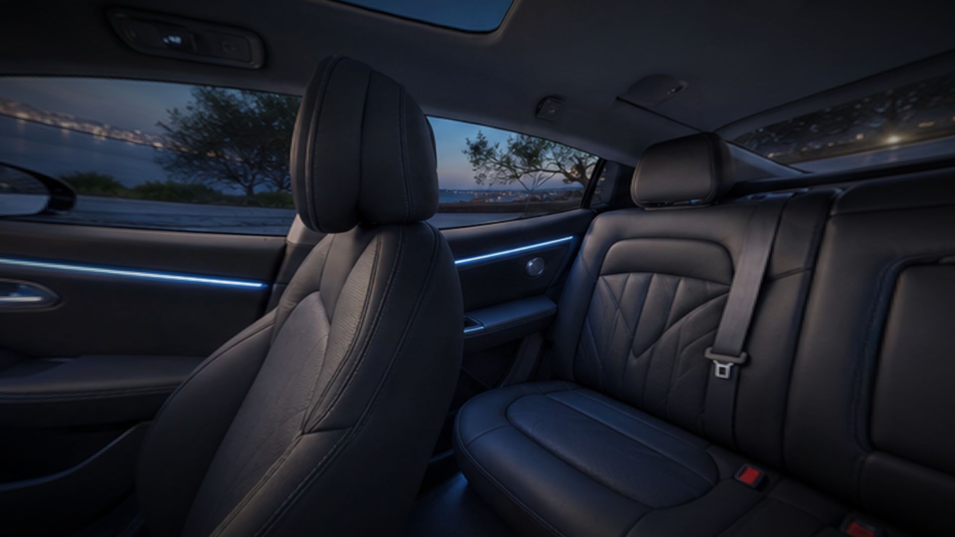 Ambient lighting across the cabin — door-panel light lines at dusk